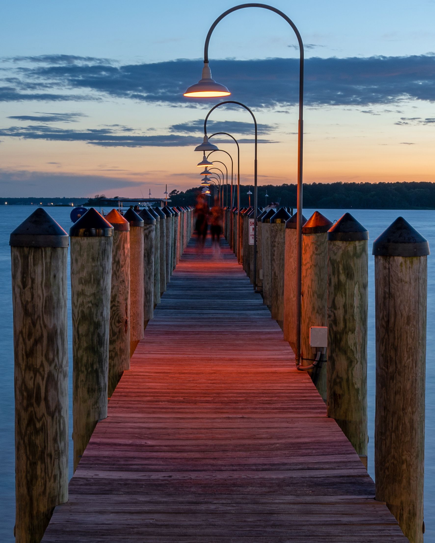 Representing Delaware is a view of Dewey Beach at sunset.