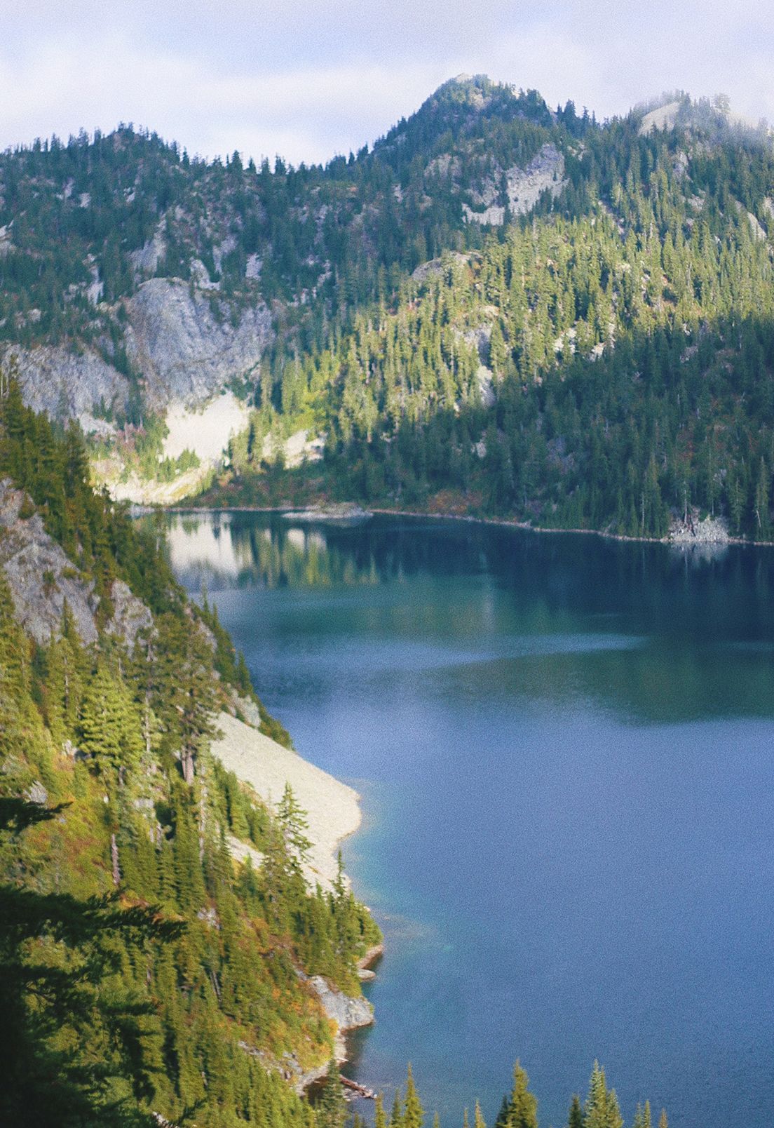 Representing Washington is a view of Mount Rainier National Park on a sunny day.