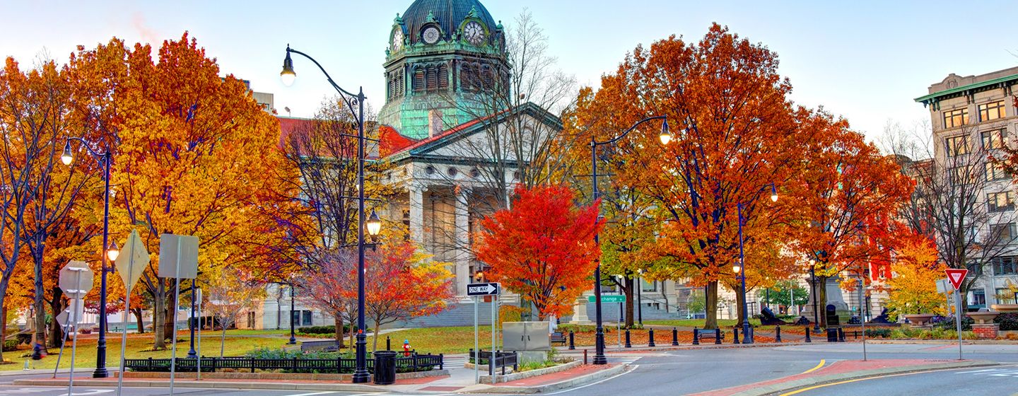 Historical landmark building surrounded by trees in Binghamton, NY.