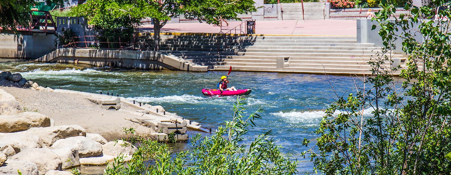 Kayaker white water rafting in Reno, Nevada.