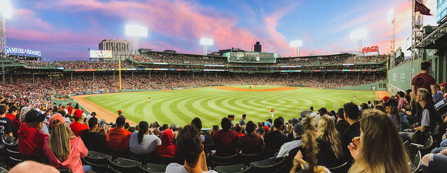 Fenway Park at night and full of fans in the state of Massachusetts.